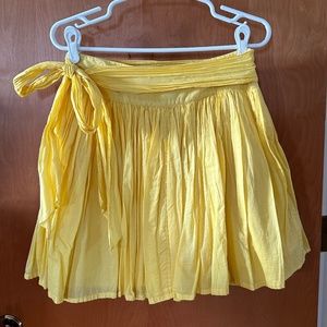Yellow skirt with attached fabric belt size 4
